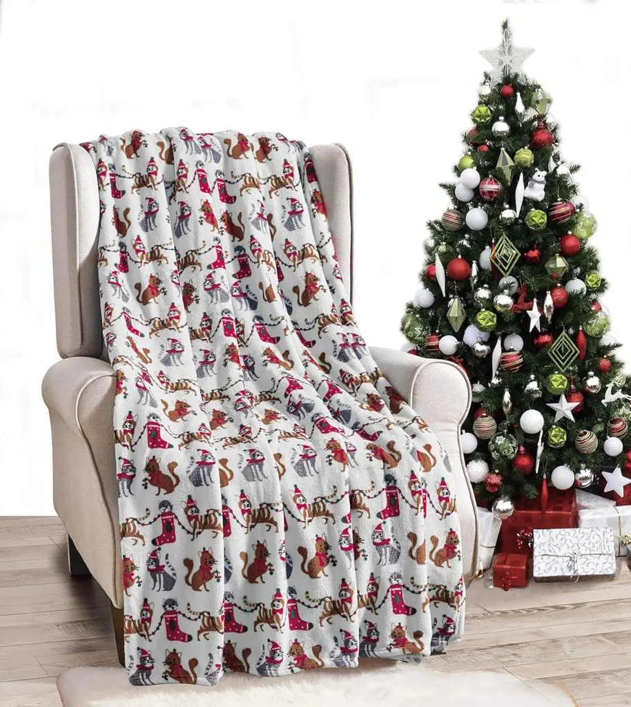 white blanket with cat christmas theme